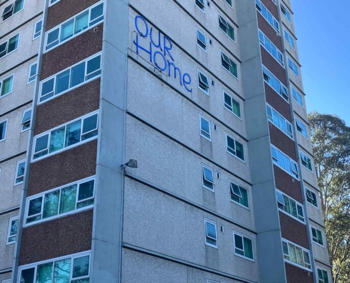 Fitzroy public housing towers against a clear blue sky